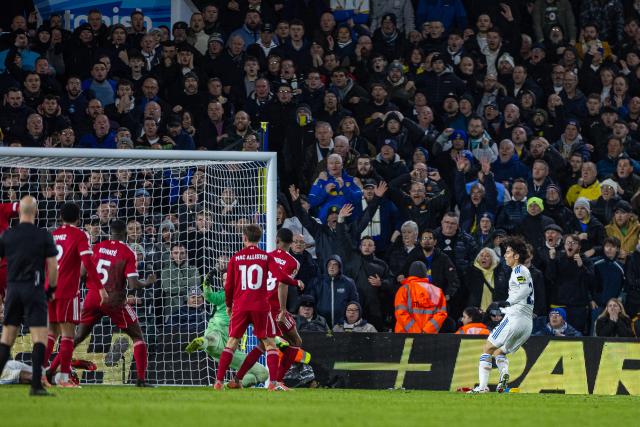 (251207) --  LEEDS, Dec. 7, 2025 (Xinhua) -- Leeds United's Ao Tanaka (1st R) scores during the English Premier League match between Leeds United and Liverpool in Leeds, Britain, on Dec. 6, 2025. (Xinhua)
FOR EDITORIAL USE ONLY. NOT FOR SALE FOR MARKETING OR ADVERTISING CAMPAIGNS. NO USE WITH UNAUTHORIZED AUDIO, VIDEO, DATA, FIXTURE LISTS, CLUB/LEAGUE LOGOS OR "LIVE" SERVICES. ONLINE IN-MATCH USE LIMITED TO 45 IMAGES, NO VIDEO EMULATION. NO USE IN BETTING, GAMES OR SINGLE CLUB/LEAGUE/PLAYER PUBLICATIONS.