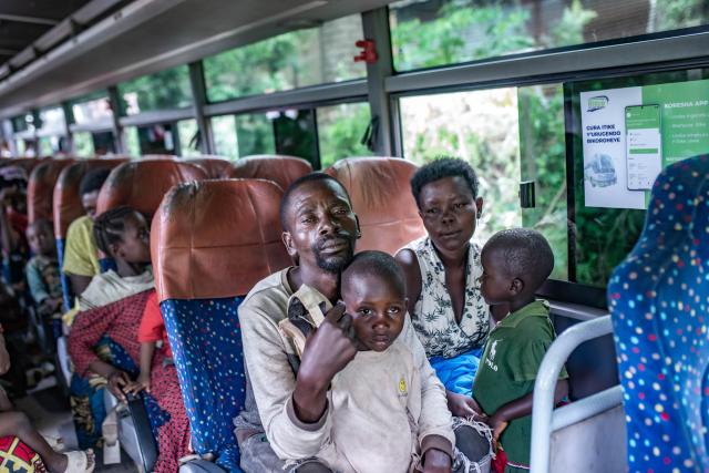 (251207) -- BUGARAMA, Dec. 7, 2025 (Xinhua) -- A displaced family from the Democratic Republic of the Congo (DRC) is seen on a bus heading for a refugee camp in the town of Bugarama in neighboring Rwanda, on Dec. 5, 2025. The March 23 Movement (M23) rebels have expanded their operations across several areas of South Kivu Province in eastern Democratic Republic of the Congo (DRC) over the past days, even as the DRC and Rwanda signed in Washington a peace deal hailed as a major step toward de-escalation in the region.
   Residents in the affected areas reported a FARDC pullback and the displacement of civilians fleeing the new combat zones. Hundreds of families have arrived in Uvira, while others from Kamanyola, a strategic crossroad in the province, crossed into Rwanda to escape shellfire. (Photo by Zanem Nety Zaidi/Xinhua)