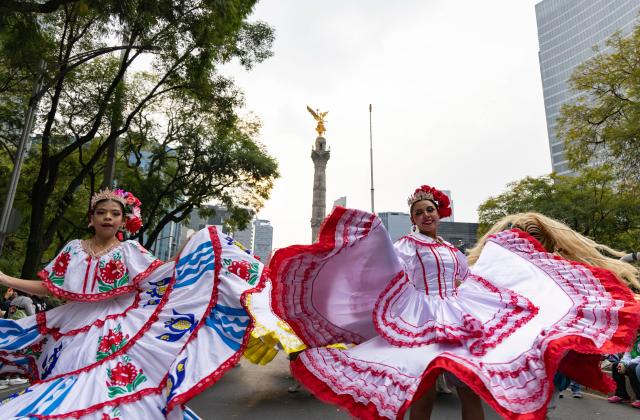 (251207) -- MEXICO CITY, Dec. 7, 2025 (Xinhua) -- Performers march in costumes during the Villa-Zapata carnival in Mexico City, Mexico, on Dec. 6, 2025. The 11th Villa-Zapata carnival was hosted in Mexico City on Saturday. Folkloric dances, traditional music, and street processions were seen along the Paseo de la Reforma avenue during the event, promoting traditional Mexican culture while paying tribute to revolutionary leaders Emiliano Zapata and Francisco Villa in the Mexican Revolution of 1910-1920. (Xinhua/Li Mengxin)
