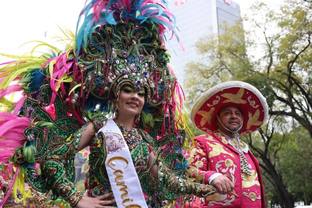 (251207) -- MEXICO CITY, Dec. 7, 2025 (Xinhua) -- Performers march in costumes during the Villa-Zapata carnival in Mexico City, Mexico, on Dec. 6, 2025. The 11th Villa-Zapata carnival was hosted in Mexico City on Saturday. Folkloric dances, traditional music, and street processions were seen along the Paseo de la Reforma avenue during the event, promoting traditional Mexican culture while paying tribute to revolutionary leaders Emiliano Zapata and Francisco Villa in the Mexican Revolution of 1910-1920. (Xinhua/Li Mengxin)