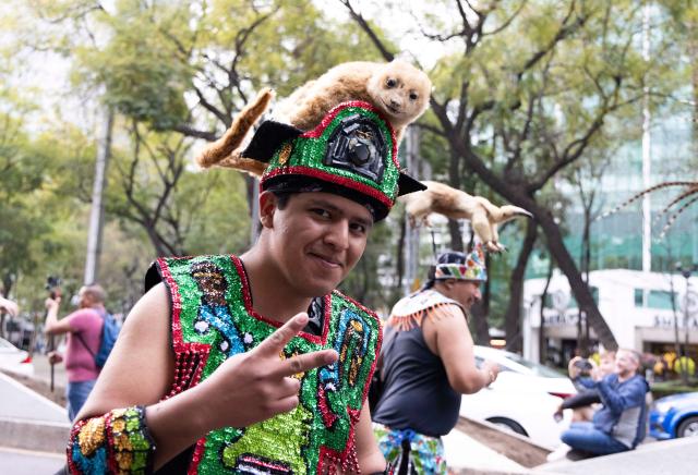 (251207) -- MEXICO CITY, Dec. 7, 2025 (Xinhua) -- A costumed performer is pictured during the Villa-Zapata carnival in Mexico City, Mexico, on Dec. 6, 2025. The 11th Villa-Zapata carnival was hosted in Mexico City on Saturday. Folkloric dances, traditional music, and street processions were seen along the Paseo de la Reforma avenue during the event, promoting traditional Mexican culture while paying tribute to revolutionary leaders Emiliano Zapata and Francisco Villa in the Mexican Revolution of 1910-1920. (Xinhua/Li Mengxin)