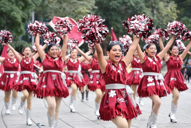 (251207) -- MEXICO CITY, Dec. 7, 2025 (Xinhua) -- Performers march in costumes during the Villa-Zapata carnival in Mexico City, Mexico, on Dec. 6, 2025. The 11th Villa-Zapata carnival was hosted in Mexico City on Saturday. Folkloric dances, traditional music, and street processions were seen along the Paseo de la Reforma avenue during the event, promoting traditional Mexican culture while paying tribute to revolutionary leaders Emiliano Zapata and Francisco Villa in the Mexican Revolution of 1910-1920. (Xinhua/Li Mengxin)