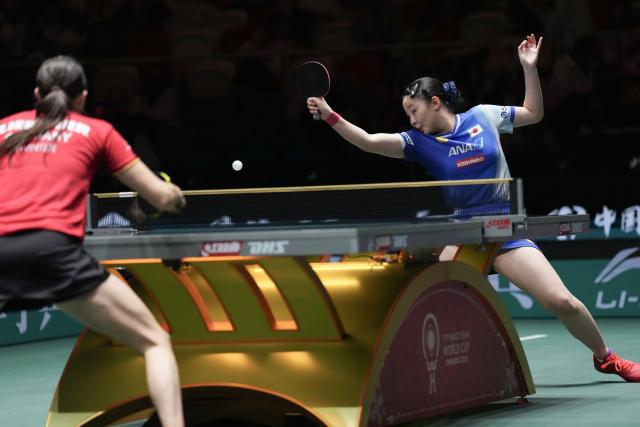 (251207) -- CHENGDU, Dec. 7, 2025 (Xinhua) -- Harimoto Miwa (R) of Japan returns the ball to Sabine Winter of Germany during the women's singles match of the semifinal between Japan and Germany at the ITTF Mixed Team World Cup 2025 in Chengdu, southwest China's Sichuan Province, Dec. 7, 2025. (Xinhua/Wang Ying)
