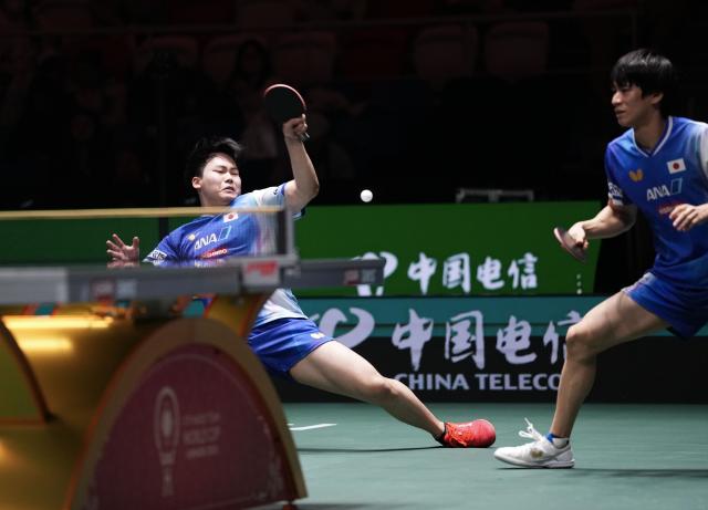 (251207) -- CHENGDU, Dec. 7, 2025 (Xinhua) -- Matsushima Sora(L)/Togami Shunsuke of Japan compete with Qiu Dang/Benedikt Duda of Germany during the men's doubles match of the semifinal between Japan and Germany at the ITTF Mixed Team World Cup 2025 in Chengdu, southwest China's Sichuan Province, Dec. 7, 2025. (Xinhua/Wang Ying)