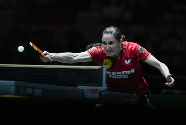 (251207) -- CHENGDU, Dec. 7, 2025 (Xinhua) -- Sabine Winter of Germany returns the ball to Harimoto Miwa of Japan during the women's singles match of the semifinal between Japan and Germany at the ITTF Mixed Team World Cup 2025 in Chengdu, southwest China's Sichuan Province, Dec. 7, 2025. (Xinhua/Wang Ying)