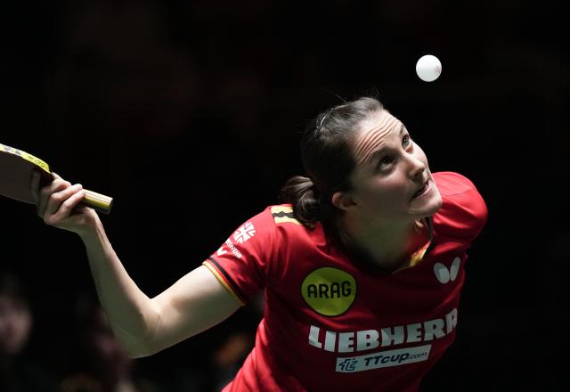 (251207) -- CHENGDU, Dec. 7, 2025 (Xinhua) -- Sabine Winter of Germany returns the ball to Harimoto Miwa of Japan during the women's singles match of the semifinal between Japan and Germany at the ITTF Mixed Team World Cup 2025 in Chengdu, southwest China's Sichuan Province, Dec. 7, 2025. (Xinhua/Wang Ying)