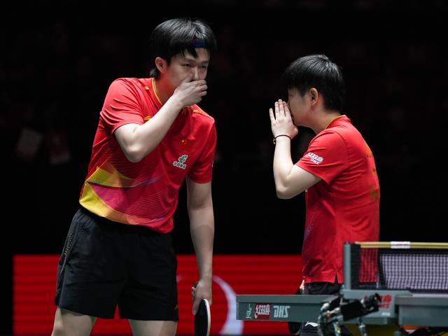 (251207) -- CHENGDU, Dec. 7, 2025 (Xinhua) -- Sun Yingsha/Wang Chuqin (L) of China communicate during the mixed doubles match against Choi Hyojoo/Oh Junsung of South Korea during the semifinal match between China and South Korea at the ITTF Mixed Team World Cup 2025 in Chengdu, southwest China's Sichuan Province, Dec. 7, 2025. (Xinhua/Wang Xi)