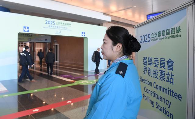 (251207) -- HONG KONG, Dec. 7, 2025 (Xinhua) -- This photo taken on Dec. 7, 2025 shows a view of the Election Committee Constituency polling station at the Hong Kong Convention and Exhibition Center in Hong Kong, south China. Voting for the election of the eighth-term Legislative Council (LegCo) of China's Hong Kong Special Administrative Region (HKSAR) kicked off Sunday morning. (Xinhua/Chen Duo)