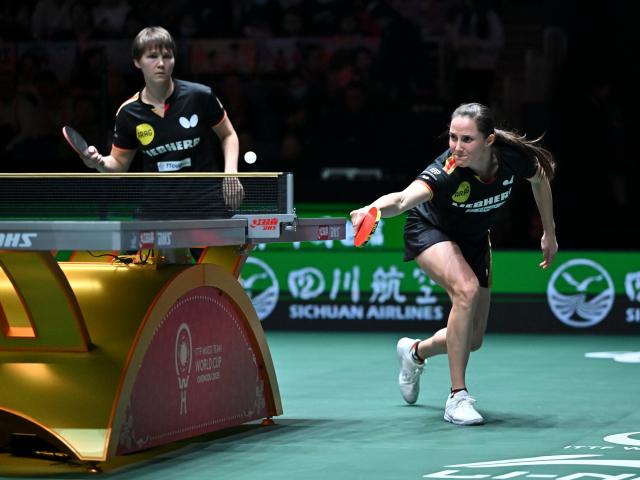 (251207) -- CHENGDU, Dec. 7, 2025 (Xinhua) -- Sabine Winter (R)/Nina Mittelham of Germany compete in the women's doubles match agaisnt Lee Eunhye/Choi Hyojoo of South Korea during the bronze medal match between South Korea and Germany at the ITTF Mixed Team World Cup 2025 in Chengdu, southwest China's Sichuan Province, Dec. 7, 2025. (Xinhua/Xu Bingjie)