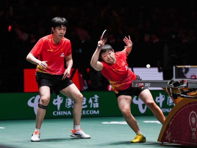 (251207) -- CHENGDU, Dec. 7, 2025 (Xinhua) -- Wang Chuqin/Sun Yingsha (R) of China compete in the mixed doubles match against Matsushima Sora/Odo Satsuki of Japan during the final match between China and Japan at the ITTF Mixed Team World Cup 2025 in Chengdu, southwest China's Sichuan Province, Dec. 7, 2025. (Xinhua/Wang Xi)