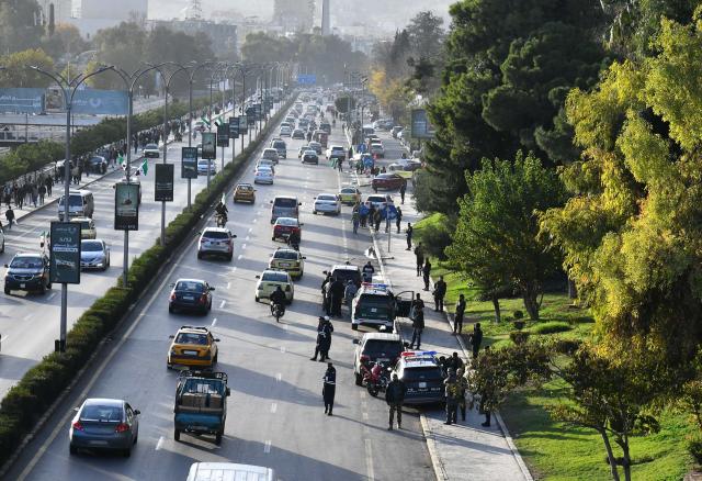 (251207) -- DAMASCUS, Dec. 7, 2025 (Xinhua) -- Policemen are seen on alert at the explosion site of a sound bomb in Damascus, Syria, Dec. 7, 2025. An explosion shook the Syrian capital of Damascus on Sunday, according to local witnesses.
   Local media said the blast was caused by a sound bomb near the Freedom Bridge -- formerly the President Bridge -- in the heart of the city. No damage or injuries were reported. (Photo by Ammar Safarjalani/Xinhua)