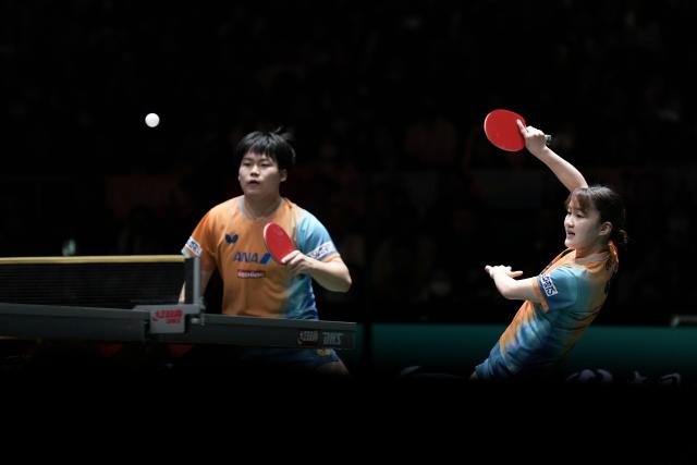 (251207) -- CHENGDU, Dec. 7, 2025 (Xinhua) -- Matsushima Sora/Odo Satsuki (R) of Japan compete in the mixed doubles match against Wang Chuqin/Sun Yingsha of China during the final match between China and Japan at the ITTF Mixed Team World Cup 2025 in Chengdu, southwest China's Sichuan Province, Dec. 7, 2025. (Xinhua/Wang Ying)