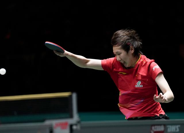 (251207) -- CHENGDU, Dec. 7, 2025 (Xinhua) -- Wang Manyu of China competes in the women's singles match against Harimoto Miwa of Japan during the final match between China and Japan at the ITTF Mixed Team World Cup 2025 in Chengdu, southwest China's Sichuan Province, Dec. 7, 2025. (Xinhua/Wang Ying)