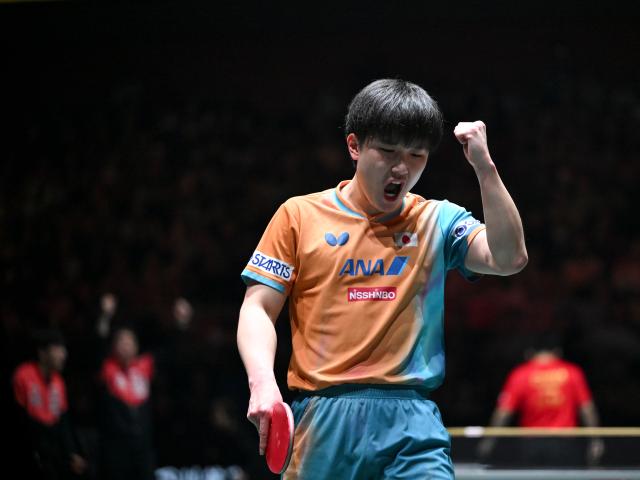 (251207) -- CHENGDU, Dec. 7, 2025 (Xinhua) -- Harimoto Tomokazu of Japan reacts in the men's singles match against Lin Shidong of China during the final match between China and Japan at the ITTF Mixed Team World Cup 2025 in Chengdu, southwest China's Sichuan Province, Dec. 7, 2025. (Xinhua/Xu Bingjie)