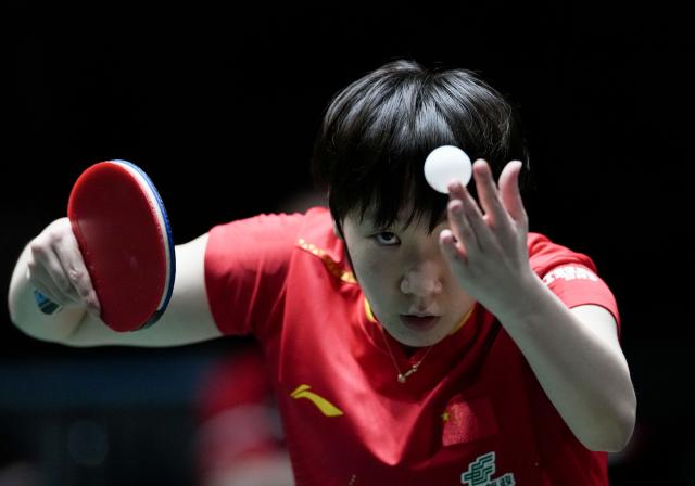 (251207) -- CHENGDU, Dec. 7, 2025 (Xinhua) -- Wang Manyu of China competes in the women's singles match against Harimoto Miwa of Japan during the final match between China and Japan at the ITTF Mixed Team World Cup 2025 in Chengdu, southwest China's Sichuan Province, Dec. 7, 2025. (Xinhua/Wang Ying)