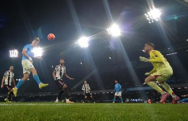 (251208) -- NAPLES, Dec. 8, 2025 (Xinhua) -- Napoli's Rasmus Hojlund (L) scores his second goal during a Serie A football match between Napoli and Juventus in Naples, Italy, Dec. 7, 2025. (Photo by Alberto Lingria/Xinhua)