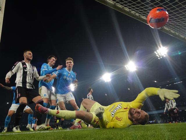 (251208) -- NAPLES, Dec. 8, 2025 (Xinhua) -- Napoli's Rasmus Hojlund (3rd L) scores his second goal during a Serie A football match between Napoli and Juventus in Naples, Italy, Dec. 7, 2025. (Photo by Alberto Lingria/Xinhua)