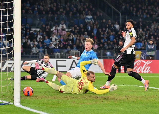 (251208) -- NAPLES, Dec. 8, 2025 (Xinhua) -- Napoli's Rasmus Hojlund scores his goal during a Serie A football match between Napoli and Juventus in Naples, Italy, Dec. 7, 2025. (Photo by Alberto Lingria/Xinhua)