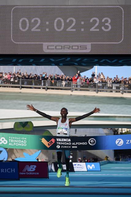 (251208) -- VALENCIA, Dec. 8, 2025 (Xinhua) -- Jhon Korir of Kenya crosses the finish line during the 2025 Valencia Marathon Trinidad Alfonso in Valencia, Spain, Dec. 7, 2025. (Xinhua)