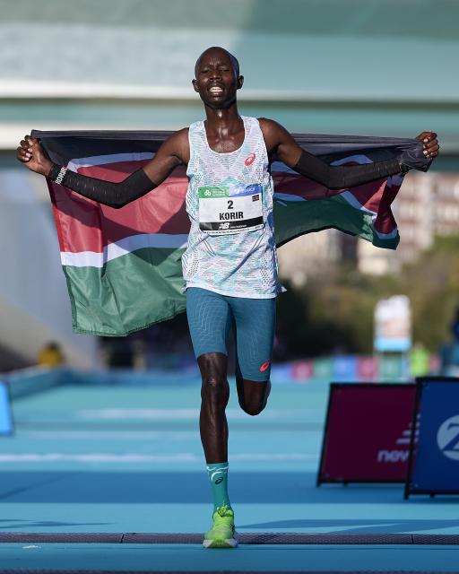 (251208) -- VALENCIA, Dec. 8, 2025 (Xinhua) -- Jhon Korir of Kenya celebrates after the 2025 Valencia Marathon Trinidad Alfonso in Valencia, Spain, Dec. 7, 2025. (Xinhua)
