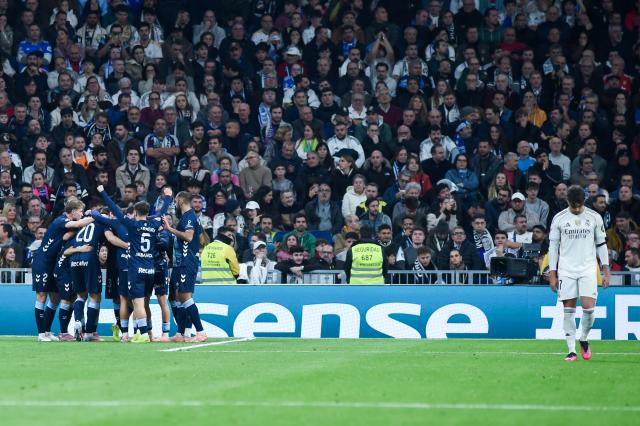(251208) -- MADRID, Dec. 8, 2025 (Xinhua) -- Celta Vigo's players celebrate a goal during a La Liga football match between Real Madrid and Celta Vigo at Santiago Bernabeu stadium in Madrid, Spain, on Dec. 7, 2025. (Photo by Gustavo Valiente/Xinhua)