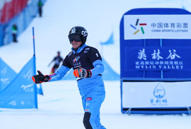 (251208) -- CHIFENG, Dec. 8, 2025 (Xinhua) -- Mirko Felicetti of Italy celebrates after the big final of the men's parallel giant slalom at the FIS Snowboard Alpine World Cup at the Mylin Valley Ski Resort in Chifeng, north China's Inner Mongolia Autonomous Region, on Dec. 7, 2025. (Photo by Kang Wenkui/Xinhua)