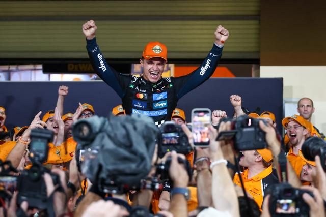 (251208) -- ABU DHABI, Dec. 8, 2025 (Xinhua) -- McLaren's Lando Norris celebrates with this team after the Formula One Abu Dhabi Grand Prix at the Yas Marina Circuit in Abu Dhabi, the United Arab Emirates, on Dec. 7, 2025. (Xinhua)