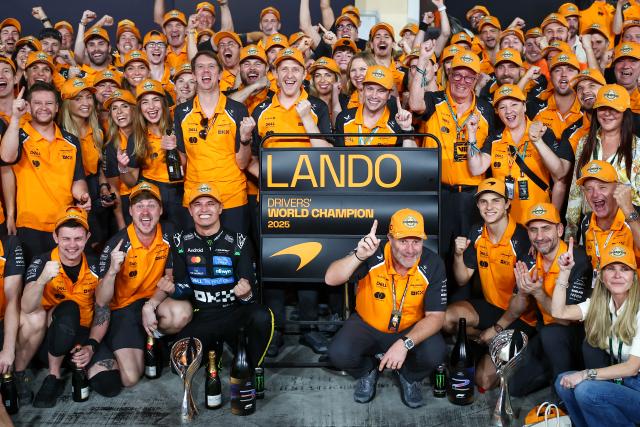 (251208) -- ABU DHABI, Dec. 8, 2025 (Xinhua) -- McLaren's Lando Norris celebrates with this team after the Formula One Abu Dhabi Grand Prix at the Yas Marina Circuit in Abu Dhabi, the United Arab Emirates, on Dec. 7, 2025. (Xinhua)