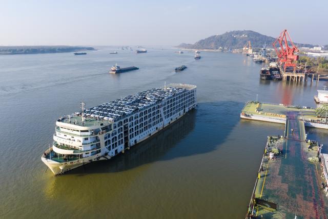 (251208) -- BEIJING, Dec. 8, 2025 (Xinhua) -- An aerial drone photo taken on Dec. 5, 2025 shows a cargo ship loaded with vehicles for export leaving Wuhu Port, east China's Anhui Province.
  China's foreign trade in goods has sustained strong resilience with steady growth in the first 11 months of 2025 despite external headwinds, official data showed on Monday.
   China's total goods imports and exports in yuan-denominated terms rose to 41.21 trillion yuan (about 5.82 trillion U.S. dollars) in the first 11 months of 2025, up 3.6 percent year on year, according to the General Administration of Customs.
  In November alone, China's goods imports and exports edged up 4.1 percent year on year to 3.9 trillion yuan, the data showed. (Photo by Xiao Benxiang/Xinhua)
