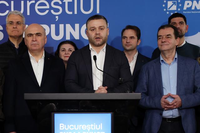 (251208) -- BUCHAREST, Dec. 8, 2025 (Xinhua) -- Ciprian Ciucu (C) reacts after the first exit poll results of partial elections for Bucharest's General Mayor in Bucharest, Romania, on Dec. 7, 2025. Ciprian Ciucu of Romania's National Liberal Party won partial elections for Bucharest's General Mayor on Sunday, securing the capital's top office.
  According to real-time data from Romania's Permanent Electoral Authority, Ciucu received 36.16 percent of the vote after all 1,289 polling stations were fully counted. (Photo by Cristian Cristel/Xinhua)