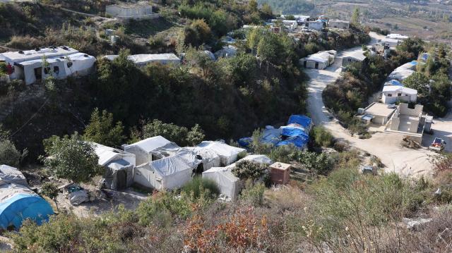 (251208) -- DAMASCUS, Dec. 8, 2025 (Xinhua) -- Temporary tents are seen at Khirbet al-Joz refugee camp in Idlib, Syria, Nov. 20, 2025. TO GO WITH "Feature: One year after Syria's war ends, displaced families return to ruins, not homes" (Xinhua)
