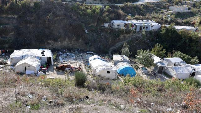 (251208) -- DAMASCUS, Dec. 8, 2025 (Xinhua) -- Temporary tents are seen at Khirbet al-Joz refugee camp in Idlib, Syria, Nov. 20, 2025. TO GO WITH "Feature: One year after Syria's war ends, displaced families return to ruins, not homes" (Xinhua)