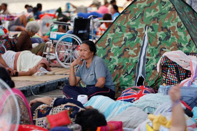 (251208) -- BURIRAM, Dec. 8, 2025 (Xinhua) -- Civilians gather in an evacuation center in Buriram province, Thailand on Dec. 8, 2025. As of 6:00 a.m. local time on Monday, approximately 70 percent of civilians in four provinces along the Thai-Cambodian border had already been evacuated, Thailand's Second Army Region said in a statement.
   According to the statement, 35,623 people were registered at temporary shelters, adding that those not in shelters were likely staying with relatives or were still in transit.
   It also confirmed one civilian death during the evacuation, attributing it to a pre-existing illness. (Xinhua)