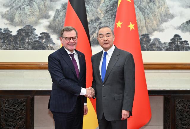 (251208) -- BEIJING, Dec. 8, 2025 (Xinhua) -- Chinese Foreign Minister Wang Yi, also a member of the Political Bureau of the Communist Party of China Central Committee, holds talks with German Foreign Minister Johann Wadephul in Beijing, capital of China, Dec. 8, 2025. (Xinhua/Dai Tianfang)