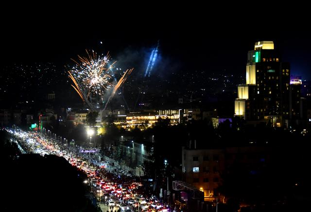 (251208) -- DAMASCUS, Dec. 8, 2025 (Xinhua) -- Fireworks light up the sky over Damascus, Syria, Dec. 8, 2025, marking the first anniversary of Syria's political transition. Syria's interim authorities staged a major military parade in the capital, Damascus, on Monday to mark the first anniversary of the country's political transition. (Photo by Ammar Safarjalani/Xinhua)