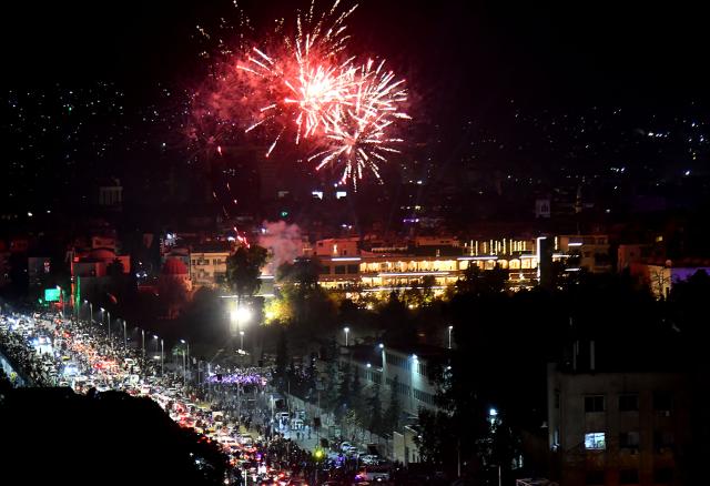 (251208) -- DAMASCUS, Dec. 8, 2025 (Xinhua) -- Fireworks light up the sky over Damascus, Syria, Dec. 8, 2025, marking the first anniversary of Syria's political transition. Syria's interim authorities staged a major military parade in the capital, Damascus, on Monday to mark the first anniversary of the country's political transition. (Photo by Ammar Safarjalani/Xinhua)