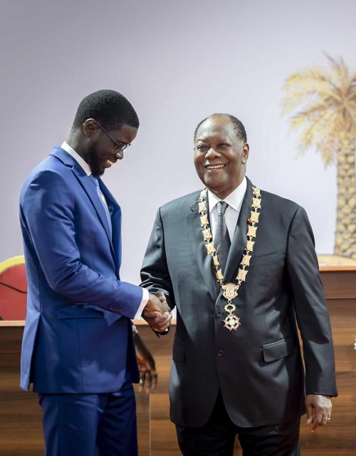 (251208) -- ABIDJAN, Dec. 8, 2025 (Xinhua) -- Cote d'Ivoire's incumbent President Alassane Ouattara (R) attends the inauguration ceremony together with Senegalese President Bassirou Diomaye Faye in Abidjan, economic capital of Cote d'Ivoire, Dec. 8, 2025. Alassane Ouattara, incumbent President of Cote d'Ivoire, was sworn in before the Constitutional Council on Monday, for a fourth five-year term, after winning the election with 89.77 percent of the votes. (Photo by Yvan Sonh/Xinhua)