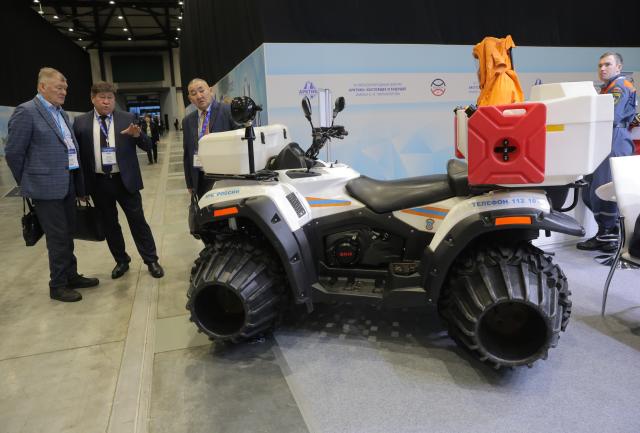 (251209) -- ST. PETERSBURG, Dec. 9, 2025 (Xinhua) -- A snowmobile is displayed at an exhibition during the 15th International Forum Arctic: Today and the Future in St. Petersburg, Russia, Dec. 9, 2025. (Photo by Irina Motina/Xinhua)