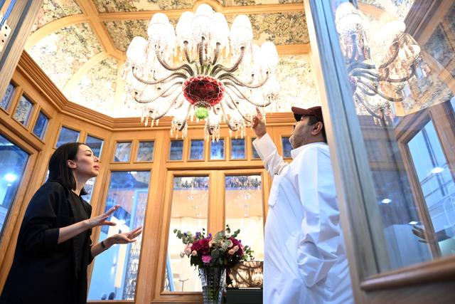 (251209) -- HAWALLI GOVERNORATE, Dec. 9, 2025 (Xinhua) -- A man visits the Mirzaam Expo in Hawalli Governorate, Kuwait, on Dec. 9, 2025. The Mirzaam Expo 2025, an interior design and decor exhibition, kicked off here on Tuesday. The expo will last for five days until Dec. 13. (Photo by Asad/Xinhua)