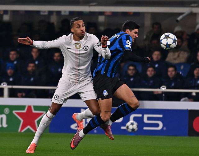 (251210) -- BERGAMO, Dec. 10, 2025 (Xinhua) -- Chelsea's Joao Pedro (L) vies with Atalanta's Raoul Bellanova during the UEFA Champions League match between Atalanta and Chelsea in Bergamo, Italy, Dec. 9, 2025. (Xinhua)