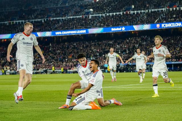 (251210) -- BARCELONA, Dec. 10, 2025 (Xinhua) -- Eintracht Frankfurt's Ansgar Knauff (C) celebrates a goal during the UEFA Champions League football match between FC Barcelona and Eintracht Frankfurt in Barcelona, Spain, Dec. 9, 2025. (Photo by Joan Gosa/Xinhua)