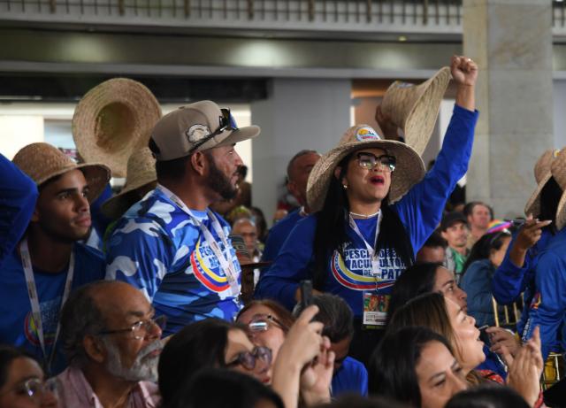 (251210) -- CARACAS, Dec. 10, 2025 (Xinhua) -- People participate in the opening of the People's Assembly for Peace and Sovereignty of Our America in Caracas, Venezuela, Dec. 9, 2025. The U.S. government is waging "psychological warfare" against Venezuela following the failure of its economic sanctions, Venezuelan Foreign Affairs Minister Yvan Gil said Tuesday.
   "They are now resorting to psychological warfare, to military psychological warfare," Gil said during the opening of the People's Assembly for Peace and Sovereignty of Our America, an event being held in Caracas. (Photo by Marcos Salgado/Xinhua)