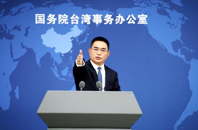 (251210) -- BEIJING, Dec. 10, 2025 (Xinhua) -- Chen Binhua, a spokesperson for the Taiwan Affairs Office of the State Council, gestures at a press conference in Beijing, capital of China, Dec. 10, 2025. (Xinhua/Pan Xu)