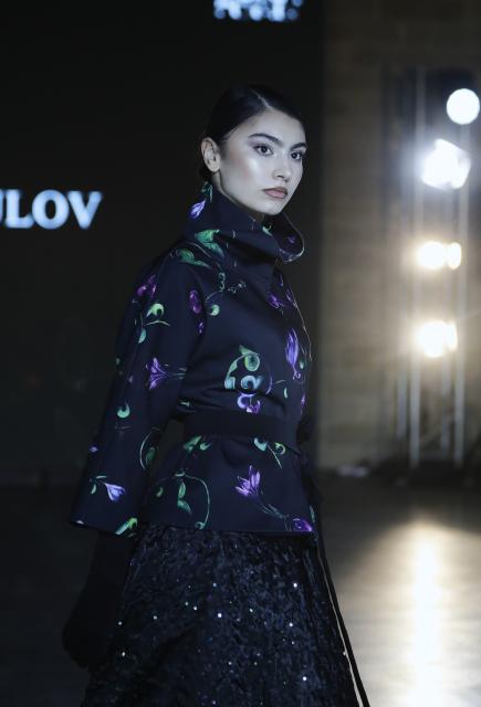 (251210) -- BAKU, Dec. 10, 2025 (Xinhua) -- A model walks the runway at the Azerbaijan international fashion week in Baku, Azerbaijan, on Dec. 9, 2025. The two-day international fashion week concluded here on Tuesday. (Xinhua/Chen Junfeng)
