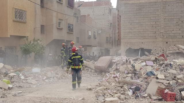 (251210) -- FES, Dec. 10, 2025 (Xinhua) -- Rescuers work at the site where two buildings collapsed in the city of Fes in Morocco, Dec. 10, 2025. At least 19 people were killed and 16 others injured when two buildings collapsed in the city of Fes in Morocco Tuesday night, the country's state news agency said. (Photo by Saouri Aissa/Xinhua)