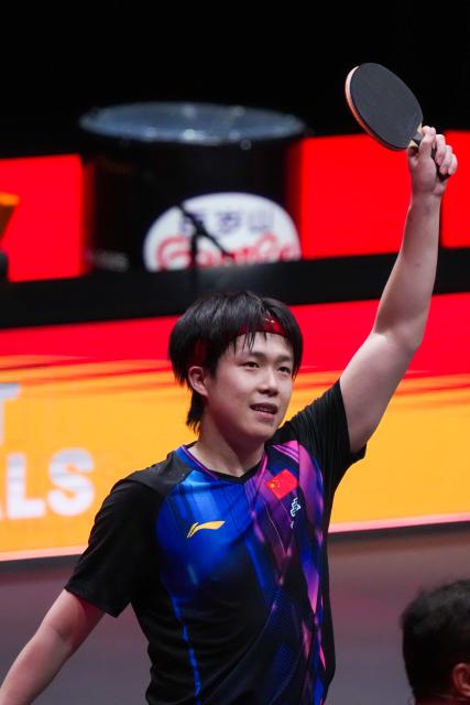(251210) -- HONG KONG, Dec. 10, 2025 (Xinhua) -- Wang Chuqin waves to the spectators after winning the men's singles round of 16 match between Wang Chuqin of China and Matsushima Sora of Japan at the WTT Finals Hong Kong 2025 in Hong Kong, south China, Dec. 10, 2025. (Xinhua/Zhu Wei)