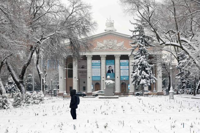 (251210) -- BISHKEK, Dec. 10, 2025 (Xinhua) -- This photo taken on Dec. 10, 2025 shows the snow-covered Kyrgyz National Opera and Ballet Theatre in Bishkek, Kyrgyzstan. (Photo by Roman/Xinhua)