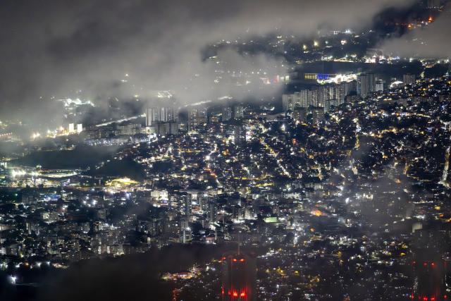 (251210) -- CARACAS, Dec. 10, 2025 (Xinhua) -- Photo taken from the Venezuela's Avila National Park on Dec. 8, 2025 shows the city of Caracas, capital of Venezuela. (Xinhua/Li Muzi)
