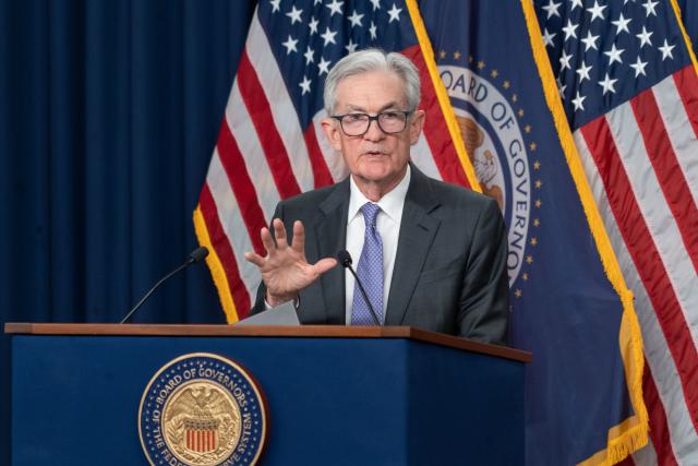 (251210) -- WASHINGTON, Dec. 10, 2025 (Xinhua) -- U.S. Federal Reserve Chair Jerome Powell attends a press conference in Washington, D.C., the United States, Dec. 10, 2025. The U.S. Federal Reserve on Wednesday decided to lower the target range for the federal funds interest rate by 25 basis points to 3.5 to 3.75 percent, marking its third rate cut this year. (Photo by Li Yuanqing/Xinhua)