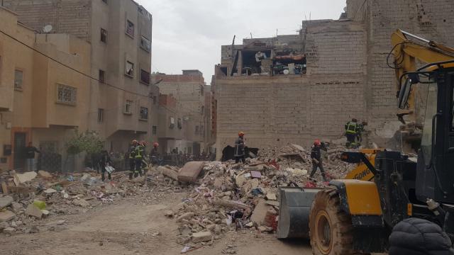 (251211) -- BEIJING, Dec. 11, 2025 (Xinhua) -- Rescuers work at the site where two buildings collapsed in the city of Fes in Morocco, Dec. 10, 2025. The death toll from the collapse of two residential buildings in the Moroccan city of Fez has risen to 22, the public prosecutor said on Wednesday, revising an earlier figure of 19.
   The incident occurred late on Tuesday in the Al-Mustaqbal neighbourhood when an unoccupied building collapsed, triggering the collapse of an adjacent four-story structure, the prosecutor said. The second building was hosting a traditional Aqiqah celebration marking a birth. (Photo by Saouri Aissa/Xinhua)